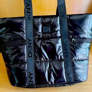 Brand new DKNY black tufted bag. Very easy to clean and nice amount of space